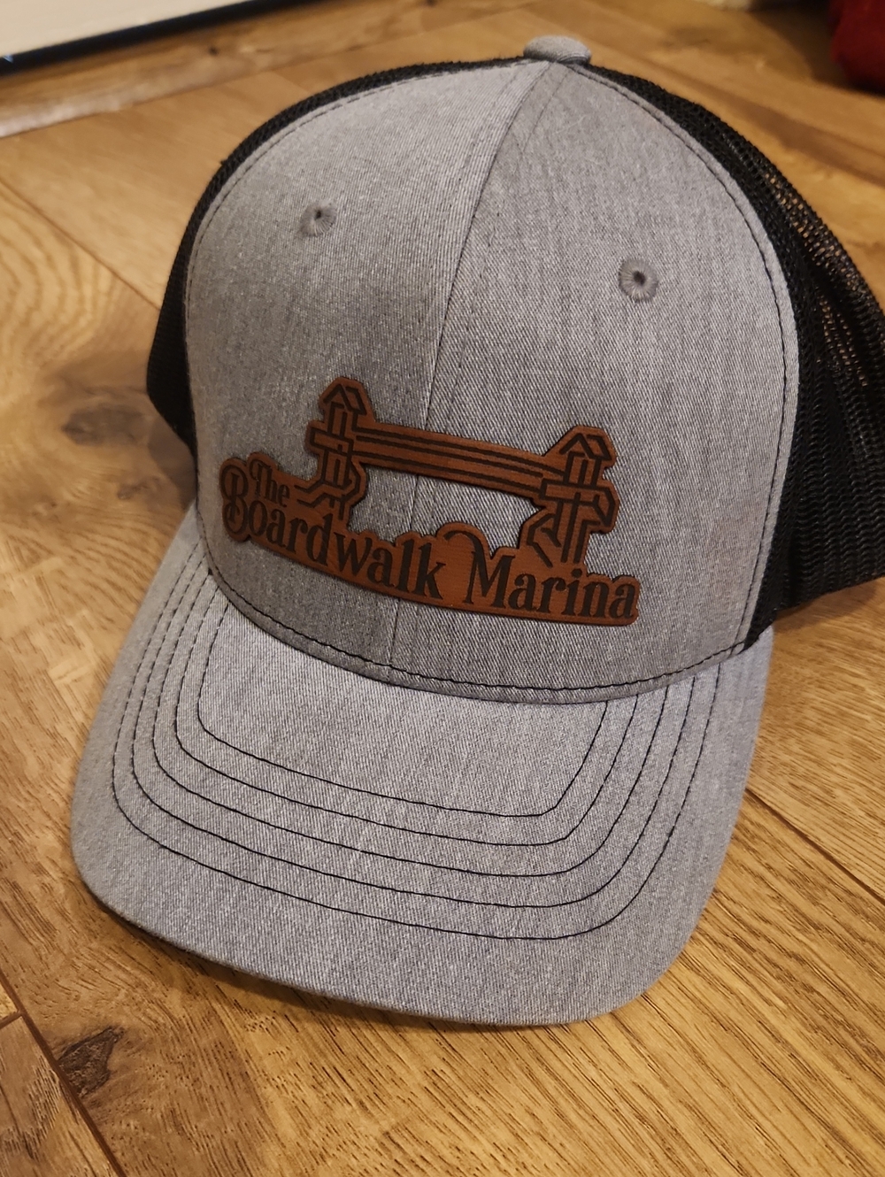 The Boardwalk Marina Gray & Black Trucker Hat